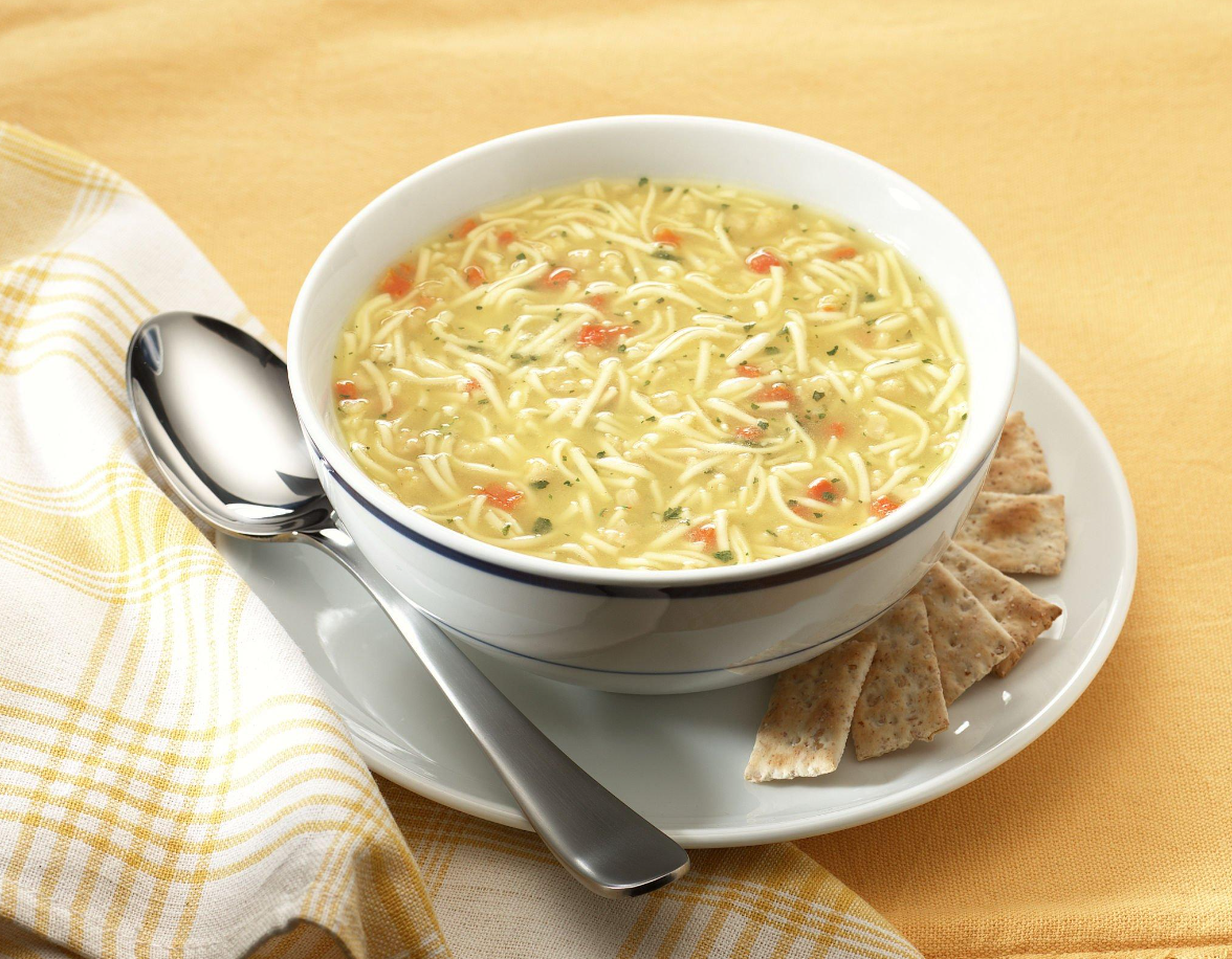 Adding fresh noodles to reheated chicken soup