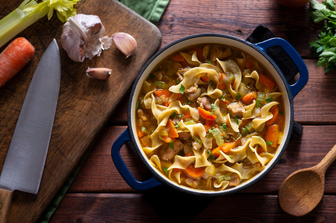 Global side dishes - steamed buns and spring rolls with chicken noodle soup