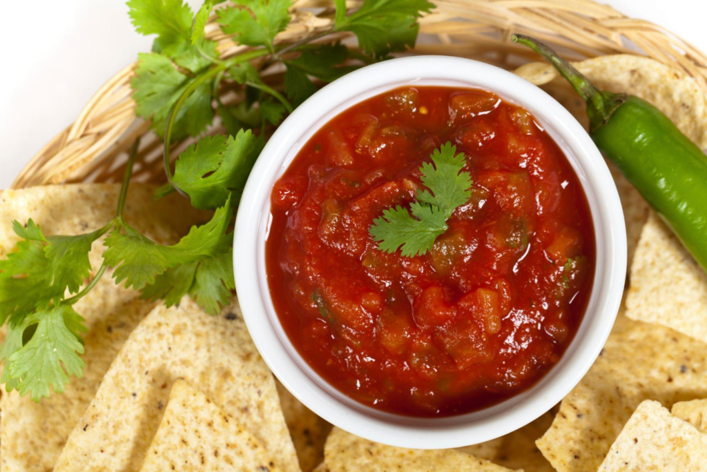 Incorporating sweet fruits like mango and pineapple to salsa for reducing heat.