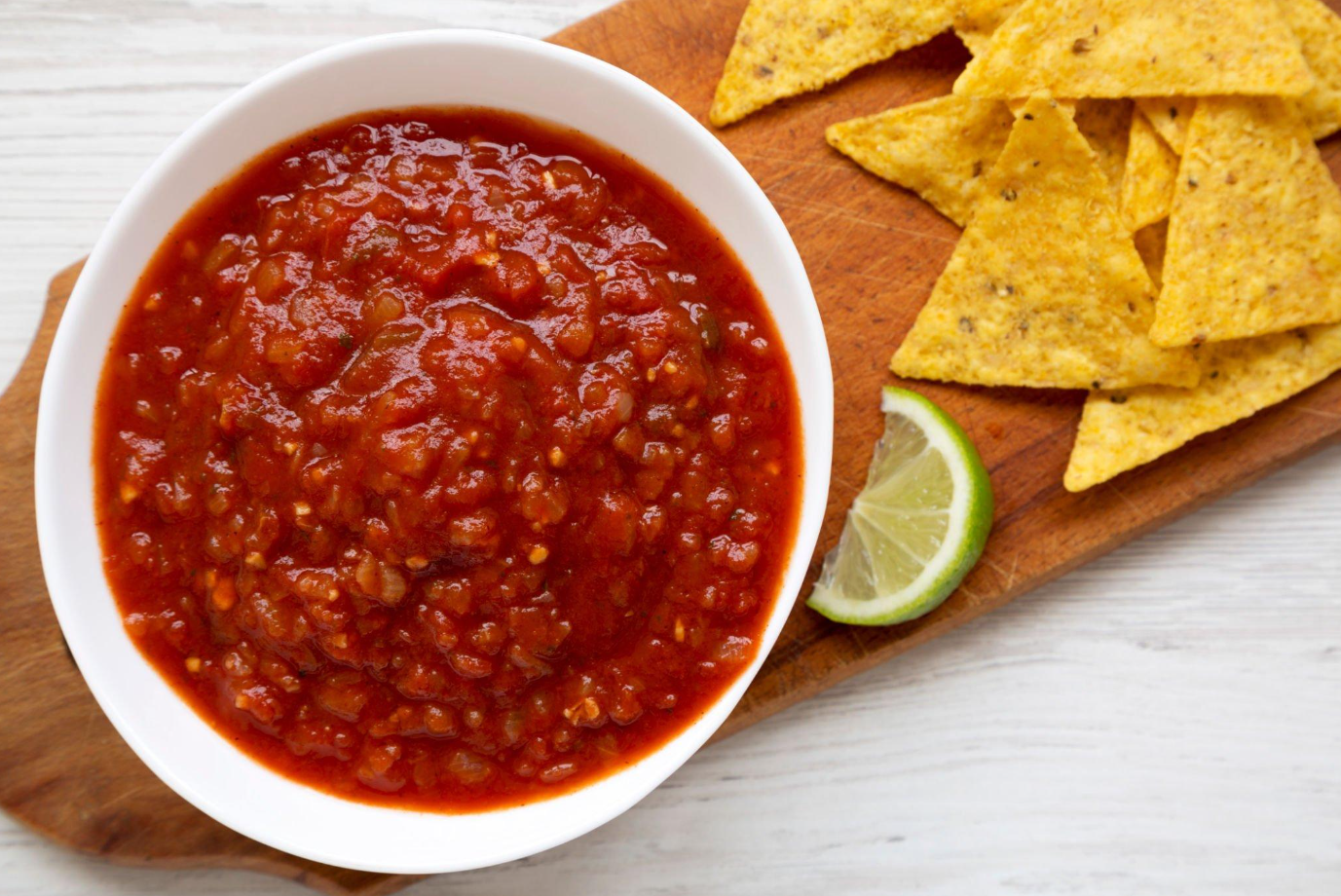 Preparing salsa with a balance of ingredients to reduce spiciness.